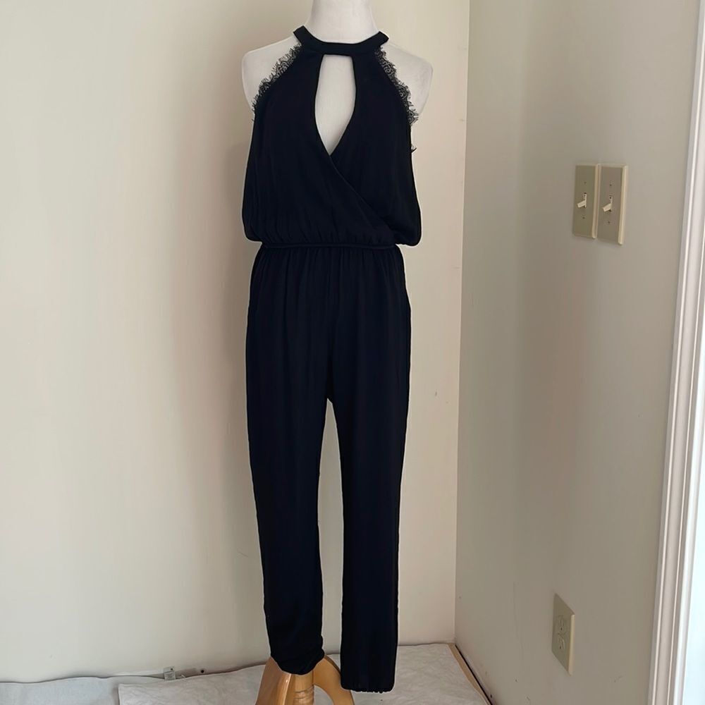 Black jumpsuit polyester size Small by love culture